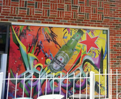 Bajwa Food Market, 104-03 104th St, Queens, NY with poster designs for Heineken byMaria Dominguez for Bodega Cultural NYC